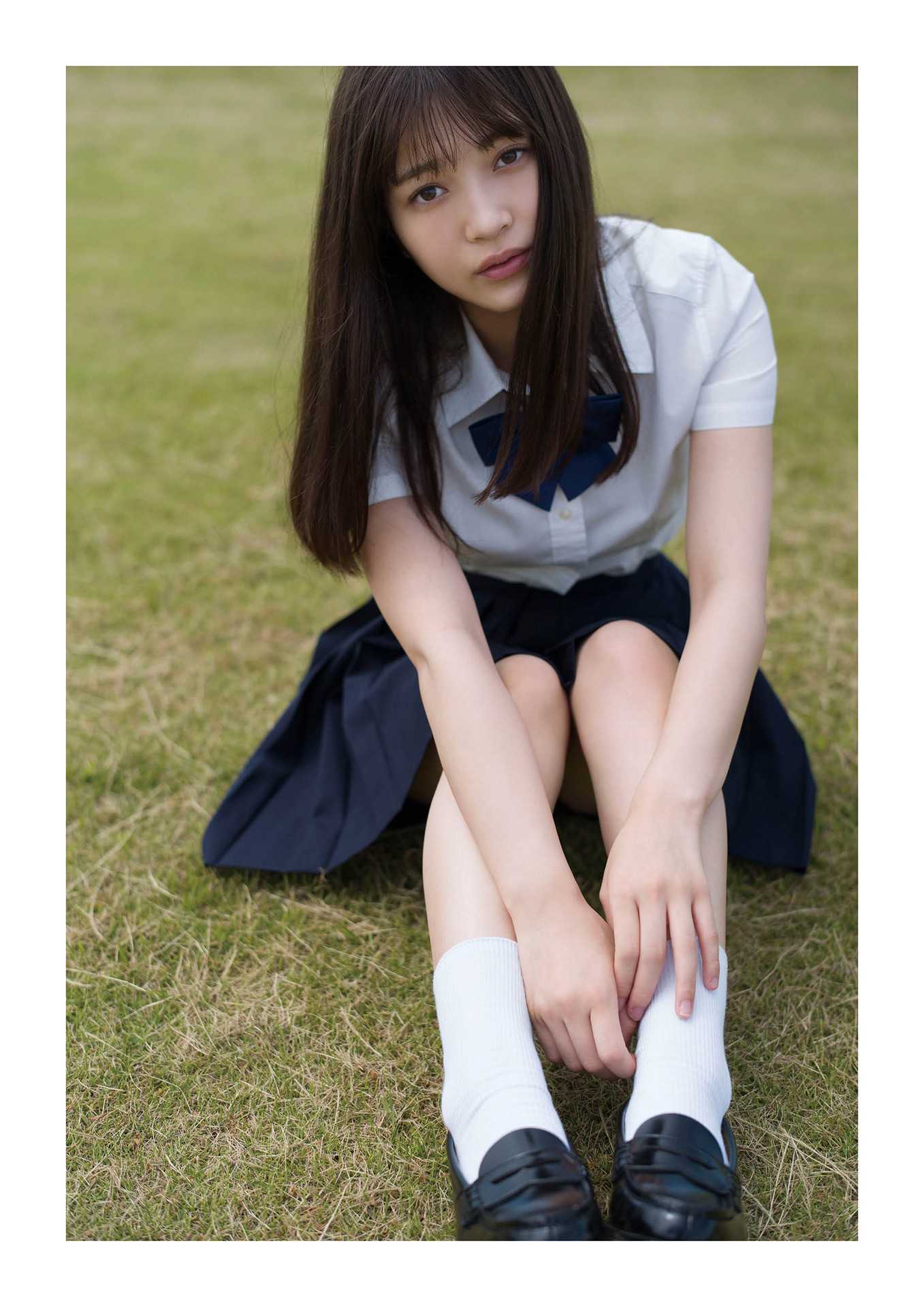7703